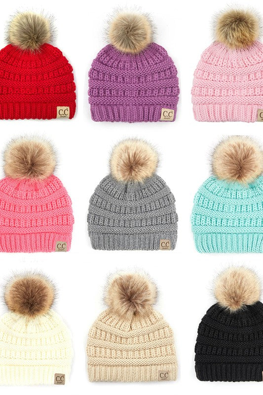 C. C Solid Ribbed Infant Natural Fur Pom Beanie